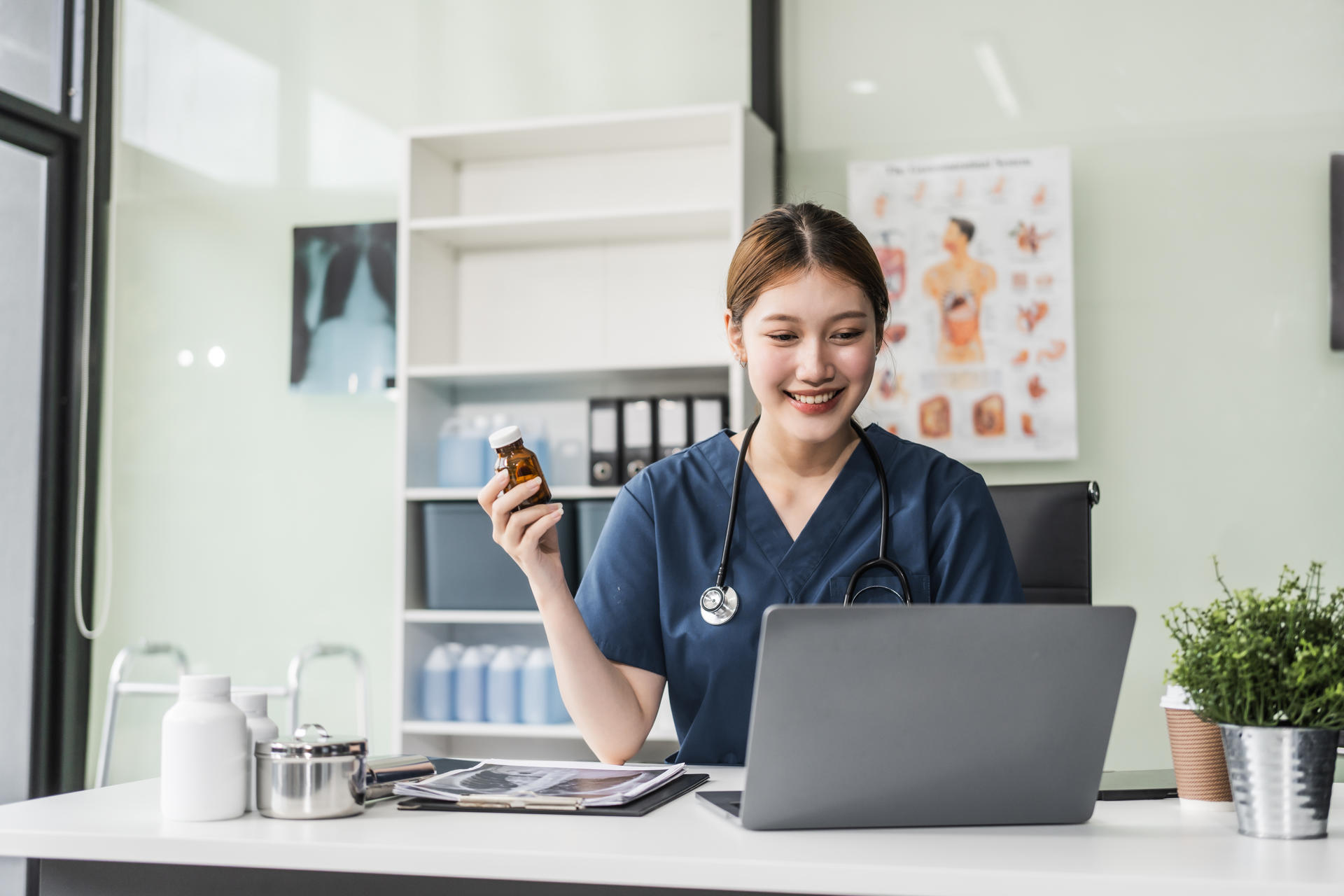 a-young-asian-nurse-providing-online-consultations-2025-02-16-02-18-09-utc.jpg